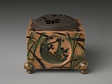 Incense Burner (kōro) with Design of Grasses, Cherry Blossoms and Butterflies, Hon&#39;ami Kōetsu (Japanese, 1558–1637), Clay; yellow glaze; decoration of flowers, grasses and butterflies; perforated iron cover (Kyoto ware), Japan