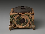 Incense Burner (kōro) with Design of Grasses, Cherry Blossoms and Butterflies, Hon&#39;ami Kōetsu (Japanese, 1558–1637), Clay; yellow glaze; decoration of flowers, grasses and butterflies; perforated iron cover (Kyoto ware), Japan