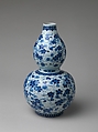Gourd-shaped vase with gourds on vines and bats, Porcelain painted in underglaze cobalt blue (Jingdezhen ware), China