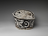 Pillow with a falcon attacking a swan, Zhang family workshop, Stoneware painted with brown and black pigment on white slip under transparent glaze (Cizhou ware), China