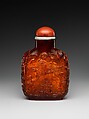 Snuff bottle with women and children in a garden, Amber with coral stopper, China