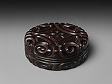 Box with pommel scrolls, Carved red and black lacquer, China