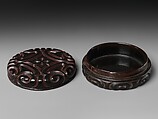 Box with pommel scrolls, Carved red and black lacquer, China