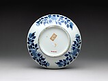 Dish with Sacred Jewels, Plum, Pine, and Bamboo, Porcelain painted with cobalt blue under and polychrome enamels over a transparent glaze (Hizen ware, Nabeshima type), Japan