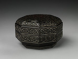 Octagonal box with pommel scrolls, Carved black lacquer with red layers (tixi), China