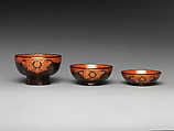 Three Nesting Bowls (Mitsuwan), Red and black lacquer on wood; applied decoration with gold and silver foil, Japan