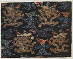 Textile fragment with dragons amid clouds, Silk satin brocaded with silk and metal thread, China