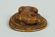 Netsuke of Animal on a Straw Mat under which is a Mouse, Ivory, Japan