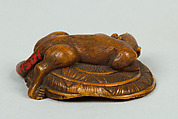 Netsuke of Animal on a Straw Mat under which is a Mouse, Ivory, Japan