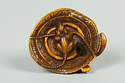 Netsuke of Animal on a Straw Mat under which is a Mouse, Ivory, Japan