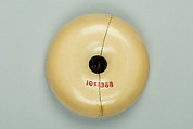 Netsuke, Ivory with bronze disk inlaid with silver, Japan