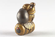 Netsuke of Daikoku and Bag on Rice Bale, Wood, Japan