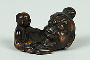 Netsuke of Sculptor Modelling a Large Head, Wood, Japan