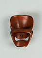 Netsuke of Mask, Wood (brown); brass eyes and lead teeth, Japan