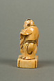 Netsuke of Man with a Bag, Standing on a Block, Ivory, Japan