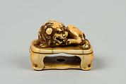 Netsuke of Lion on a Stand, Ivory, Japan