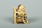 Netsuke of Hotei Seated in an Armchair, Ivory ornamented with lacquer, Japan