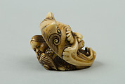 Netsuke of Okame under a Demon Mask, Ivory, Japan