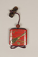 Inrō with the Noh Play Ebira (Quiver), Three cases; lacquered wood with gold, silver, color takamaki-e, hiramaki-e on red ground
Netsuke: fossilized wood
Ojime: carved red lacquer bead, Japan
