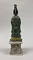 Figure of a fairy holding a peach, Porcelain painted in polychrome enamels on the biscuit (Jingdezhen ware), China