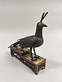 Figure of a Peacock, Bronze, gold or brass inlay, teakwood stand, Japan