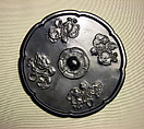 Mirror with floral designs
, Bronze with black patina, China