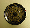 Mirror with knobs and swirls, Bronze with black patina, China