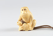Netsuke of Seated Monkey with Persimmon, Ivory, Japan