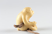 Netsuke of Seated Monkey with Persimmon, Ivory, Japan