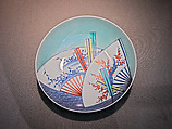 Dish with Floating Fans with Bamboo Grass (Sasa) and Plum Motifs, Porcelain with celadon glaze, painted with cobalt blue under and polychrome enamels over a transparent glaze (Hizen ware, Nabeshima type), Japan