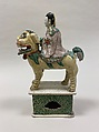 Figure of Bodhisattva Guanyin riding a lion, Porcelain painted in polychrome enamels over the biscuit (Jingdezhen ware), China