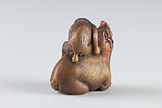 Netsuke of Monkey Attacking a Boar, Ivory-stained brown, Japan