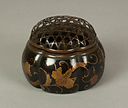 Melon-Shaped Incense Burner (Akoda Kōro) with Paulownia and Foliage Scroll, Lacquered wood with gold hiramaki-e and e-nashiji (“pear-skin picture”) on black ground  , Japan