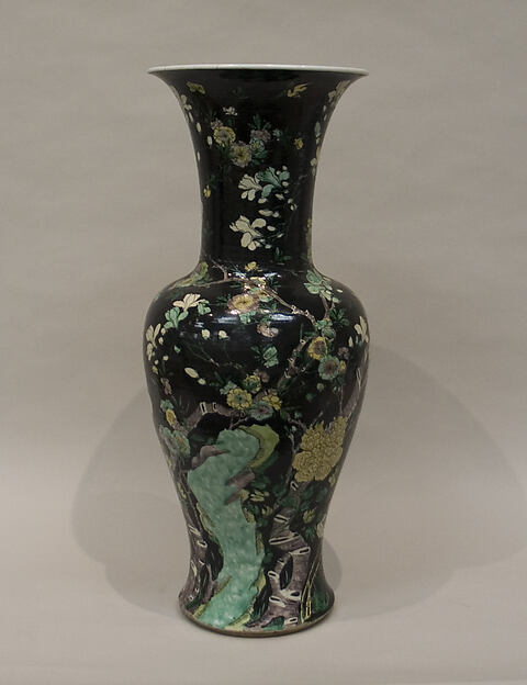 Vase with flowers and birds
