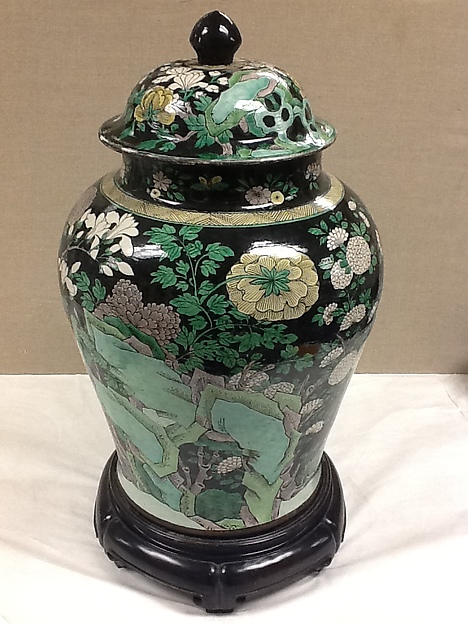 Covered jar with flowers