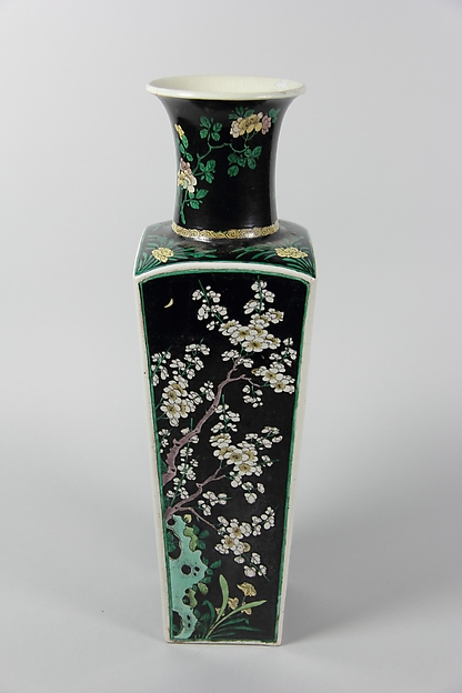 Square vase with flowers of four seasons