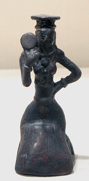 Mirror Handle with a Woman Holding a Mirror by an unrecorded maker, The Metropolitan Museum of Art