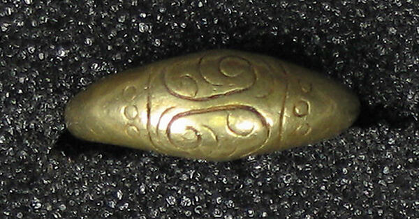 Ring Cast with Incised Scrolls