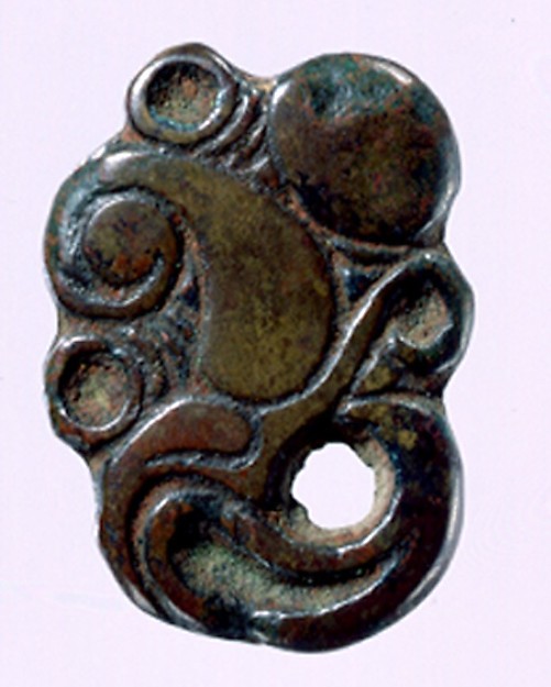 Garment Plaque in the Shape of a Raptor's Head by an unrecorded maker, The Metropolitan Museum of Art