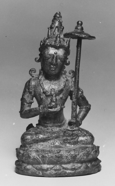 Seated Male Deity Holding a Parasol and an Unidentified Object by an unrecorded maker, The Metropolitan Museum of Art