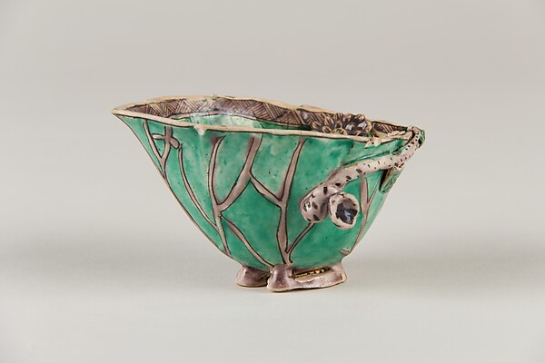 Cup in form of flowers and leafs