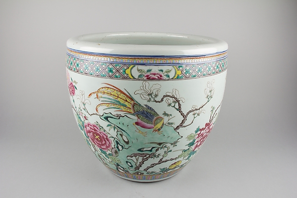 Fishbowl with birds and flowers