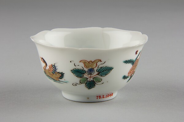 Cup with duck, fish, and flowers