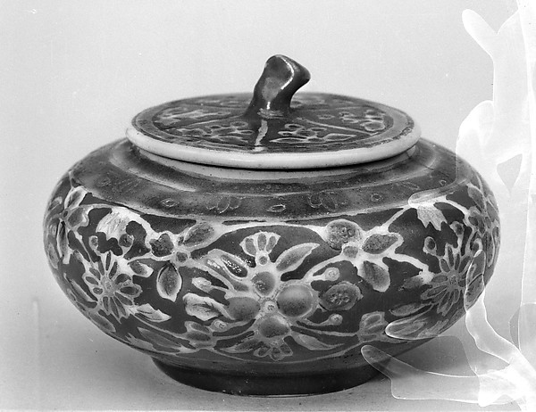 Covered jar with floral pattern