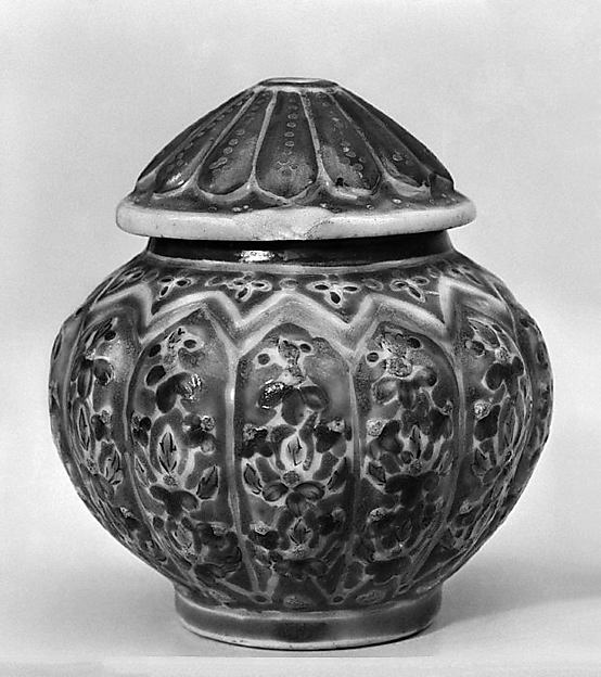 Covered jar with floral pattern