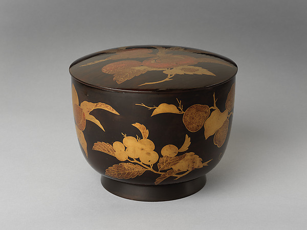 Rice server with decoration of autumn fruit on a branch