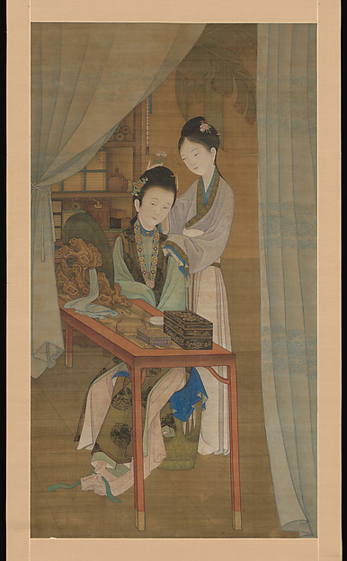 Woman at her dressing table
