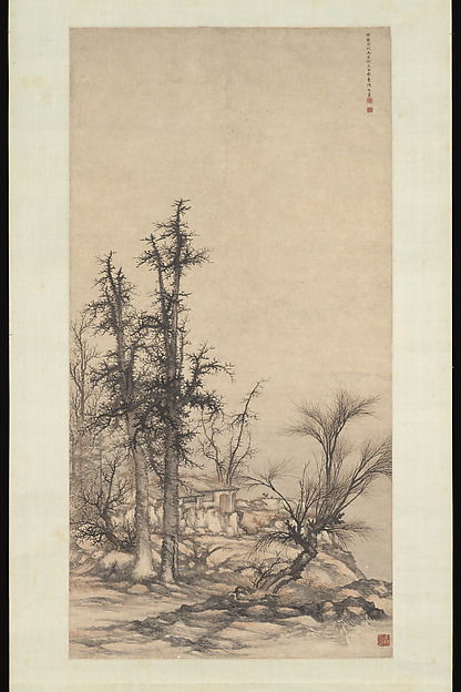 Small dwelling in a dense grove of trees