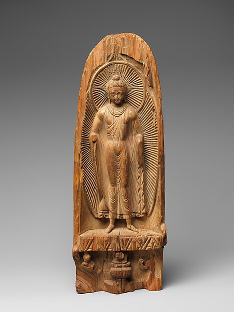 Buddha with radiate halo and mandorla