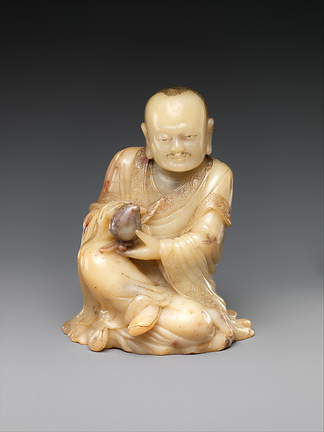Buddhist disciple, or luohan, holding a peach, 17th century